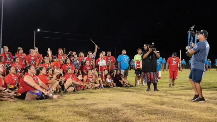 Chief Batton presents Tvshka Homma Ohoyo with their championship trophy