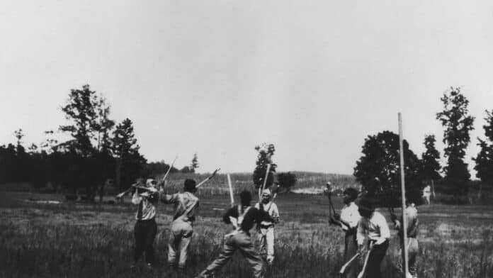 Choctaw men playing stickball in July 1925