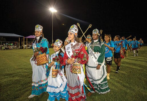 Newly crowned Choctaw Princesses lead the way onto the field