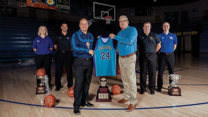 Chief Gary Batton and the new Southeastern Oklahoma State University basketball jerseys