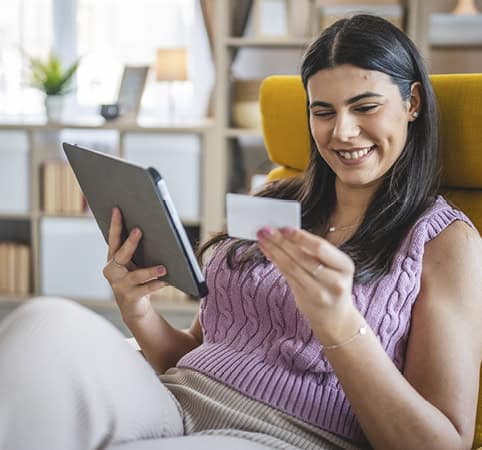 Woman looking at her tribal membership card