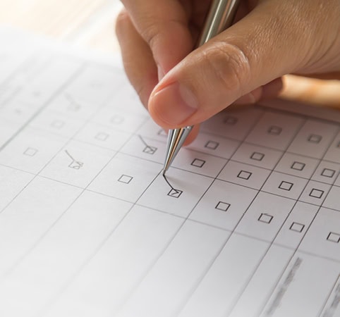 Tribal member checking boxes of eligibility